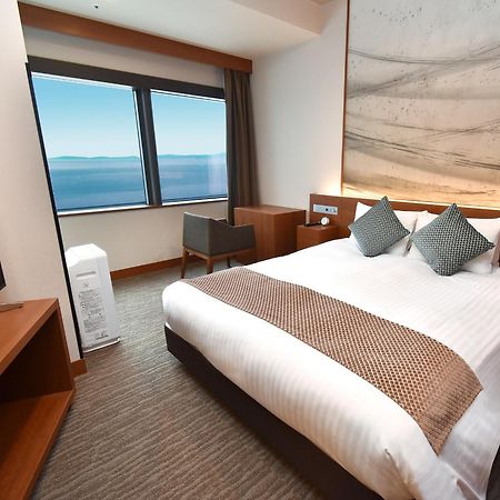 Odysis Suites Osaka Airport Hotel Izumisano Exterior photo