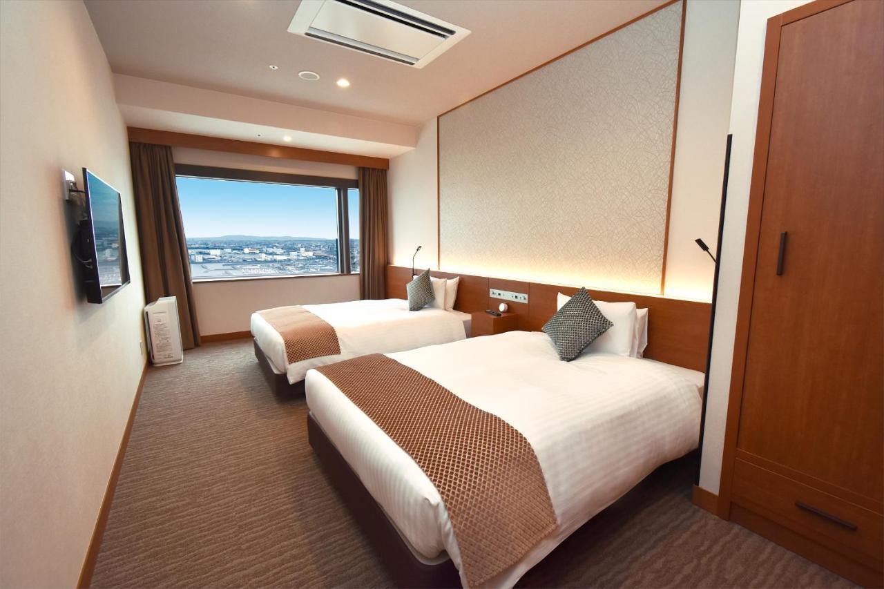 Odysis Suites Osaka Airport Hotel Izumisano Exterior photo