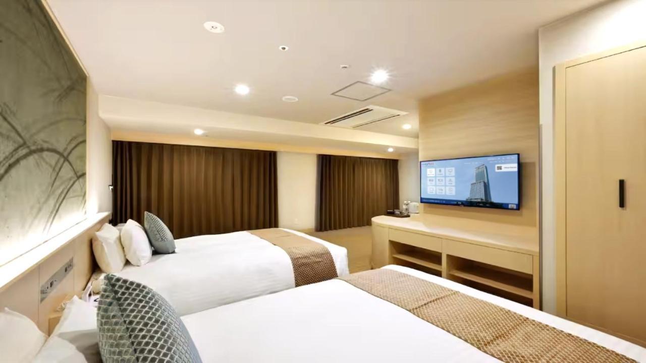 Odysis Suites Osaka Airport Hotel Izumisano Exterior photo