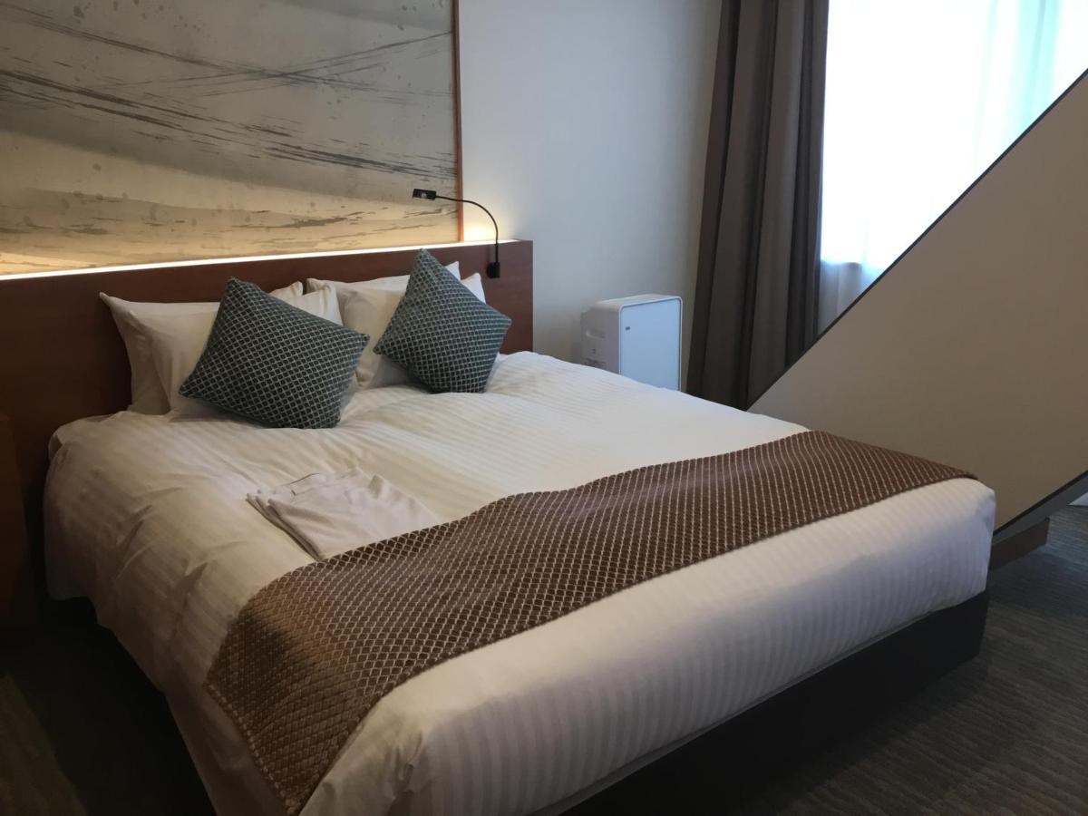Odysis Suites Osaka Airport Hotel Izumisano Exterior photo