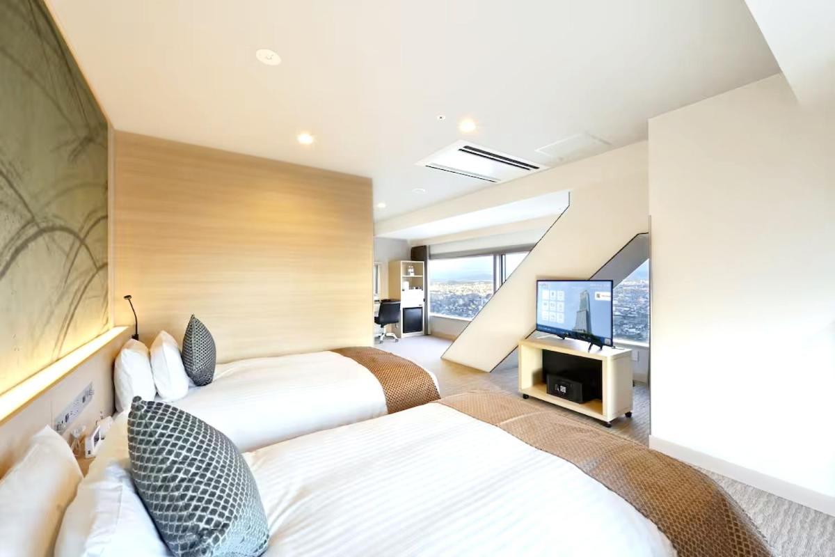 Odysis Suites Osaka Airport Hotel Izumisano Exterior photo